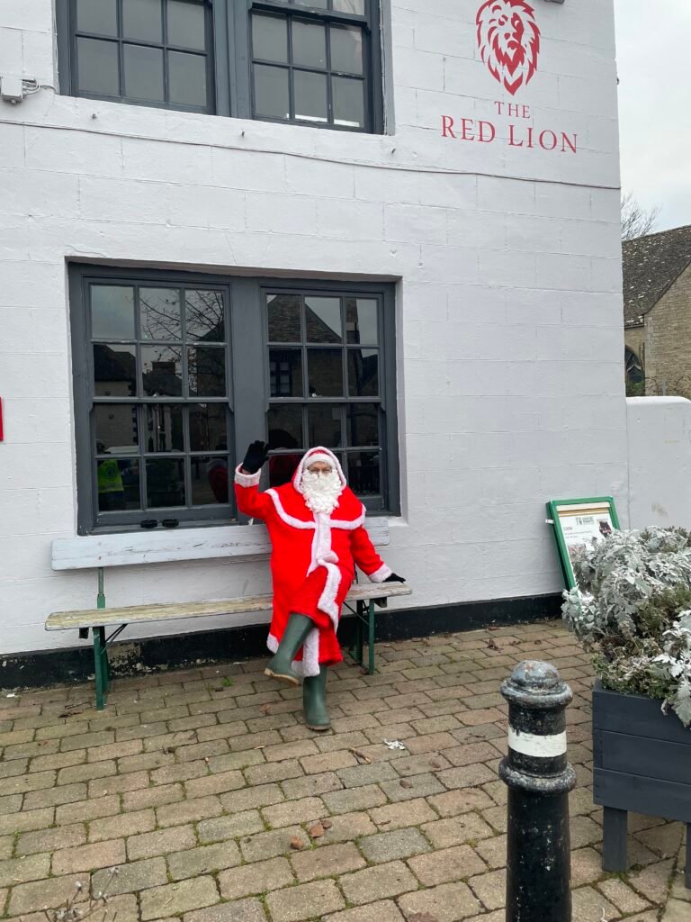 Santa sitting down taking a well earned break