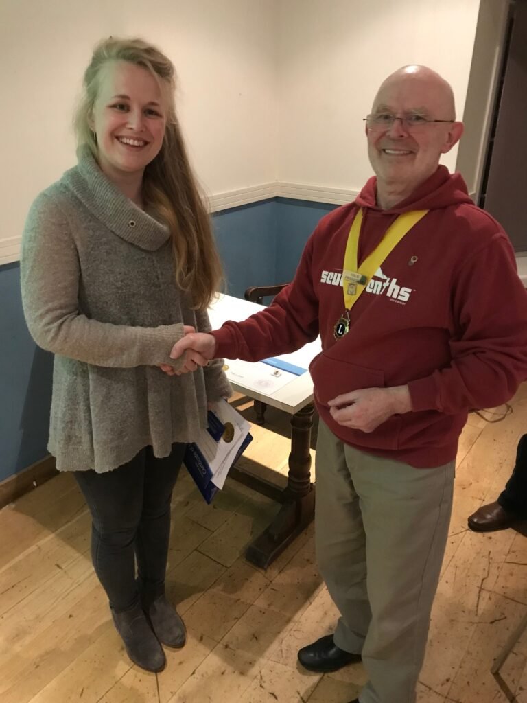 Lion Wyn congratulates new member, Laura