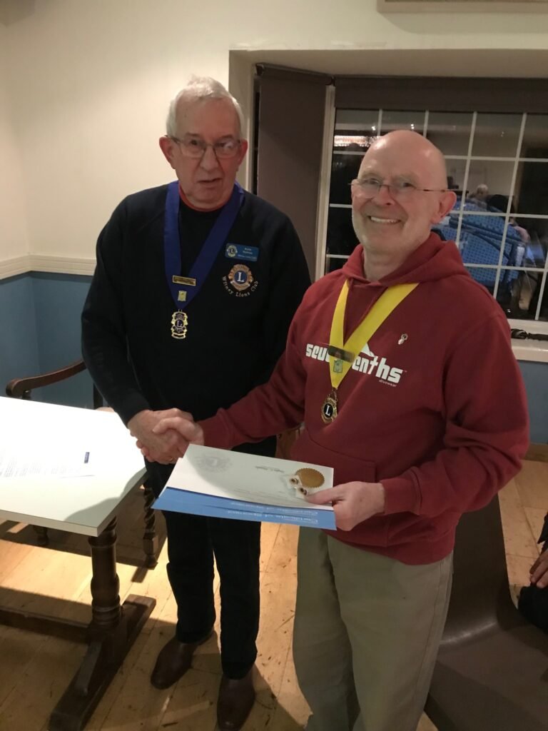 Lion Wyn receives Sponsorship certificates from President Keith